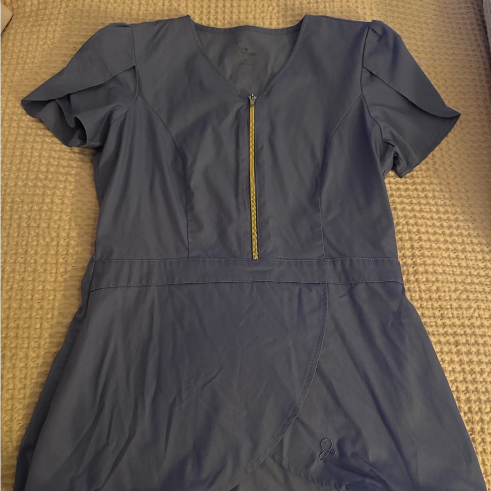 Jaanuu peplum scrub top